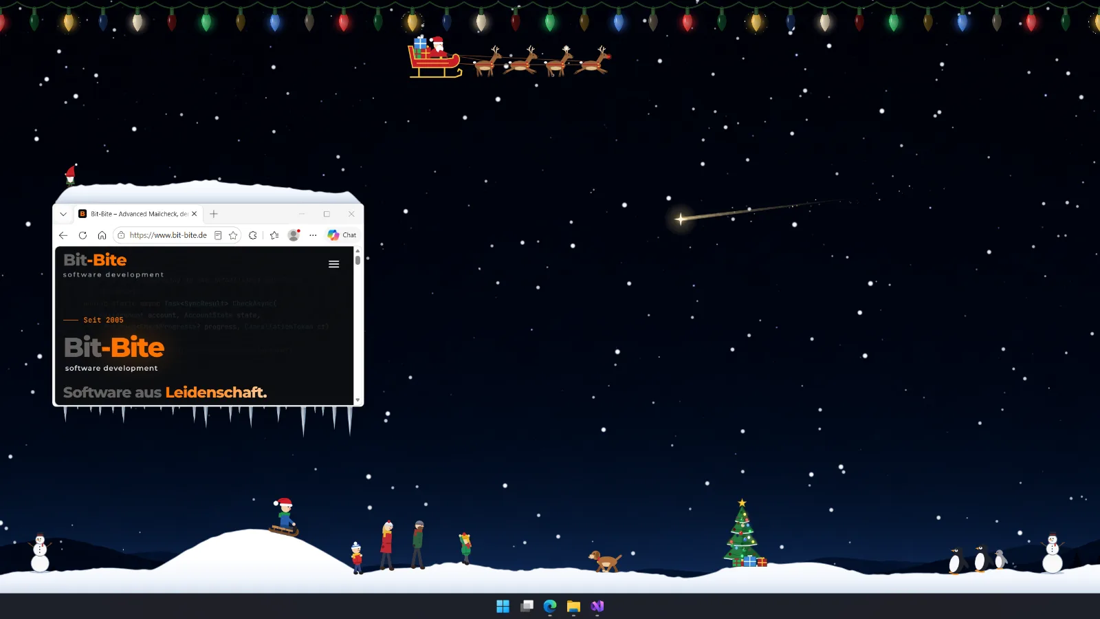 Windows desktop with snow on a browser window, icicles, a light chain, Santa and winter figures